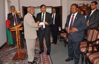 Ambassador Mr C.B. Thapliyal hands over of Cash Grant of US$ 37,350 to the President of Senate